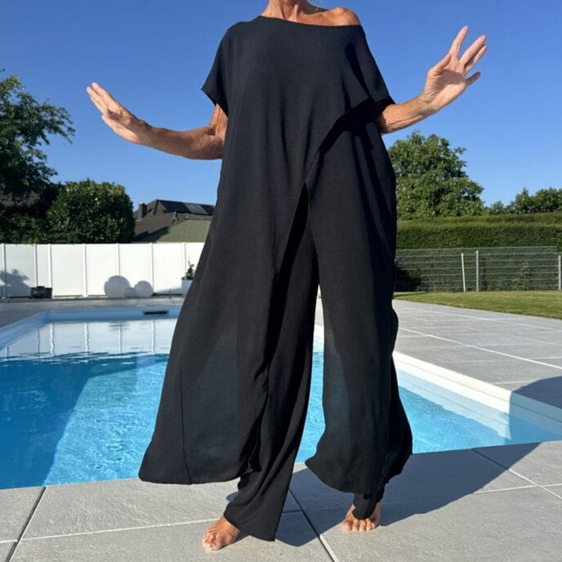 Set med enfärgad topp utan axel och byxor