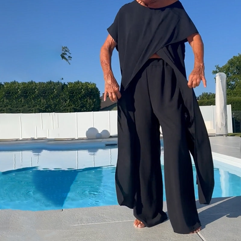 Set med enfärgad topp utan axel och byxor
