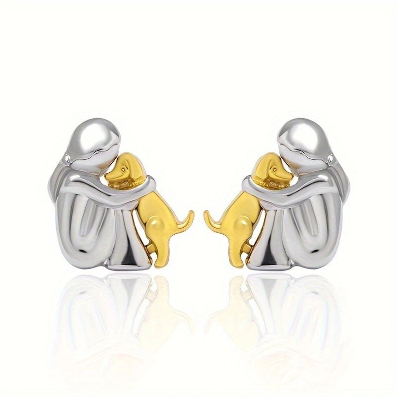 Oorbellen en ketting met kleine meisje dat hond knuffelt