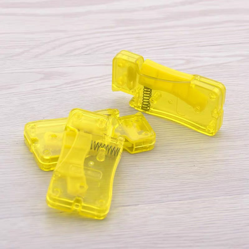 Hulpstuk voor het inrijgen van naalden